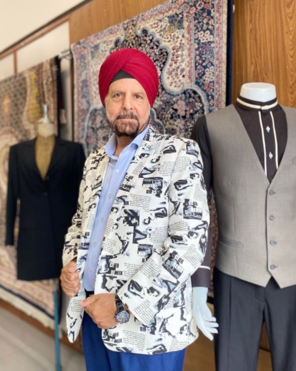 Frank in a printed jacket beside two made-to-measure suits